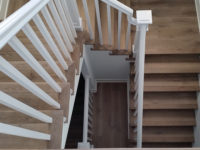 brown-hardwood-spiral-stairs