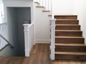 brown-hardwood-spiral-stairs-landing