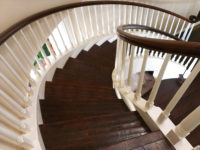 dark-brown-hardwood-floors-spiral-staircase